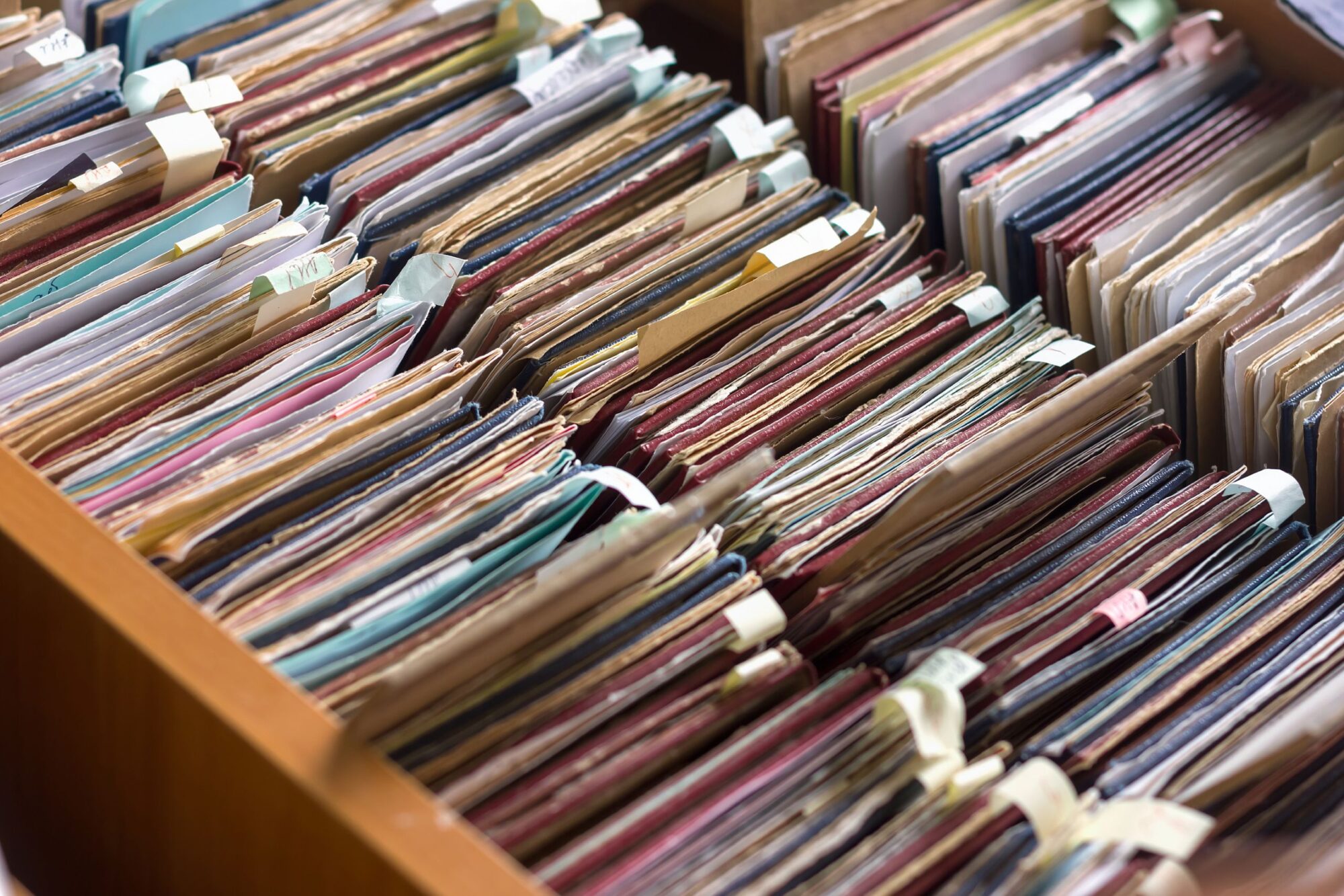 Top view of old files in a file drawer